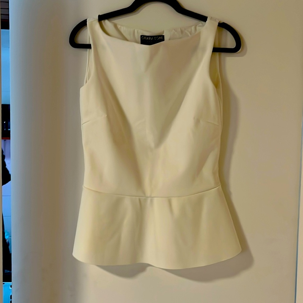 White top with slight flare no buttons or zipper